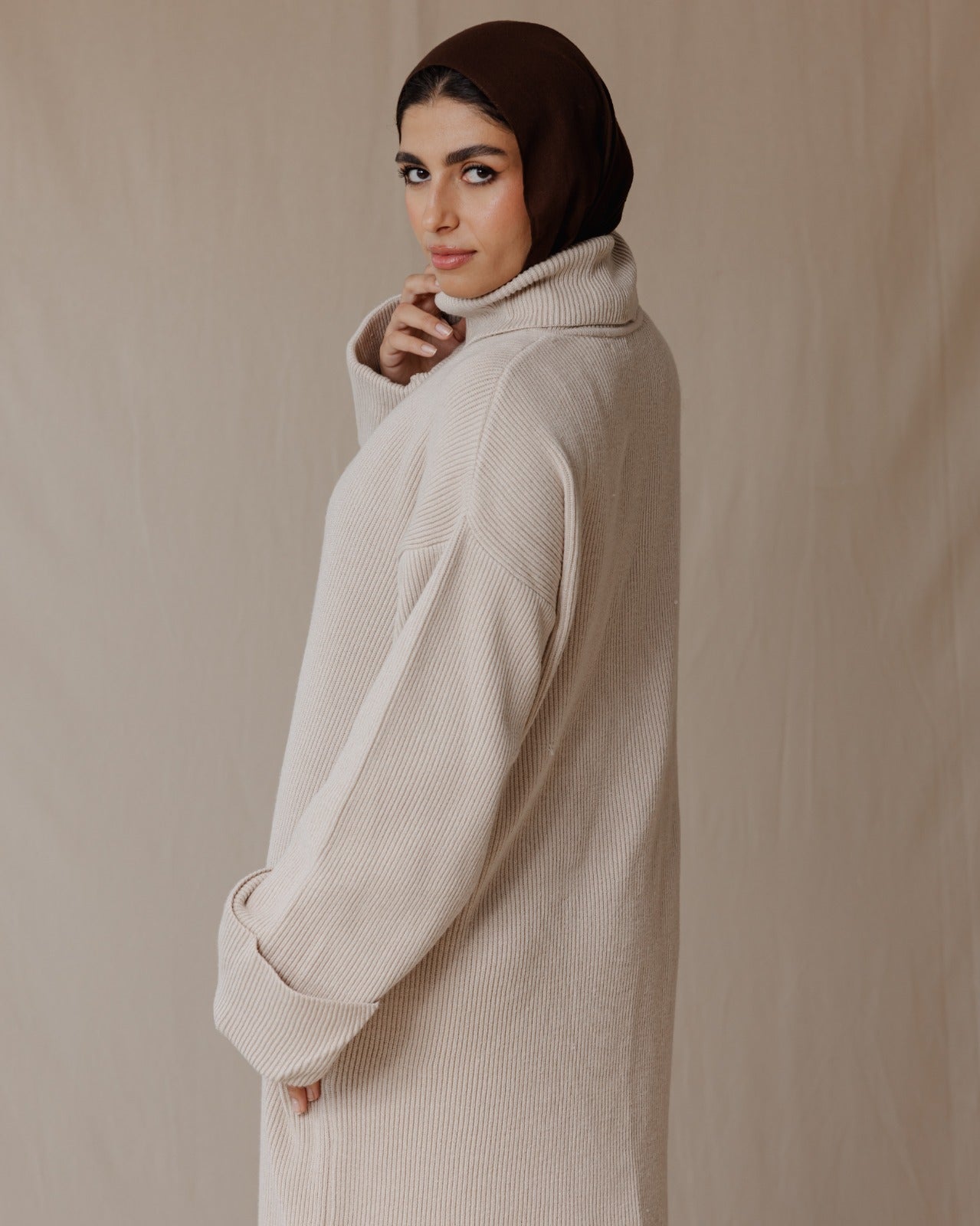 Abito caldo in maglia beige