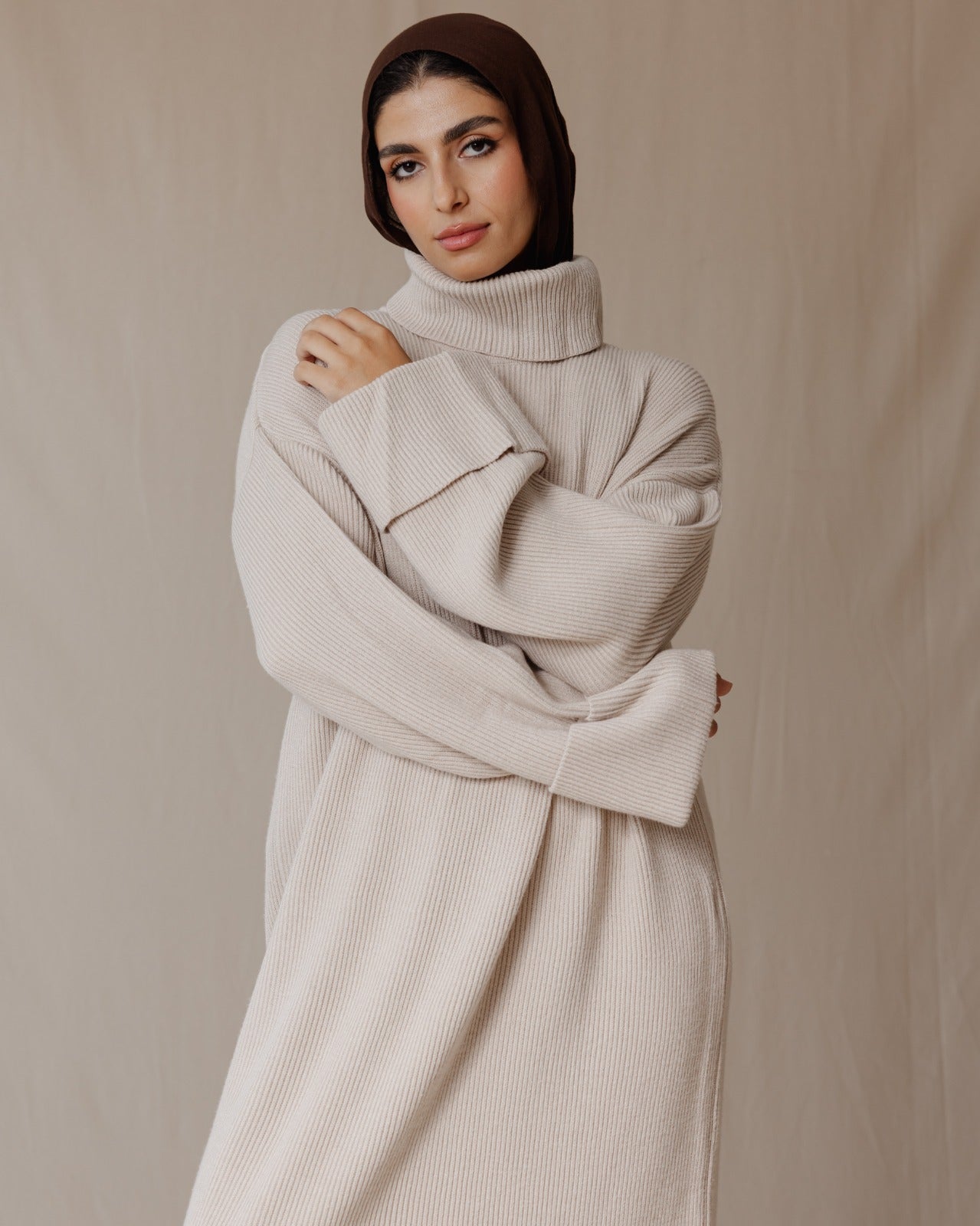 Abito caldo in maglia beige