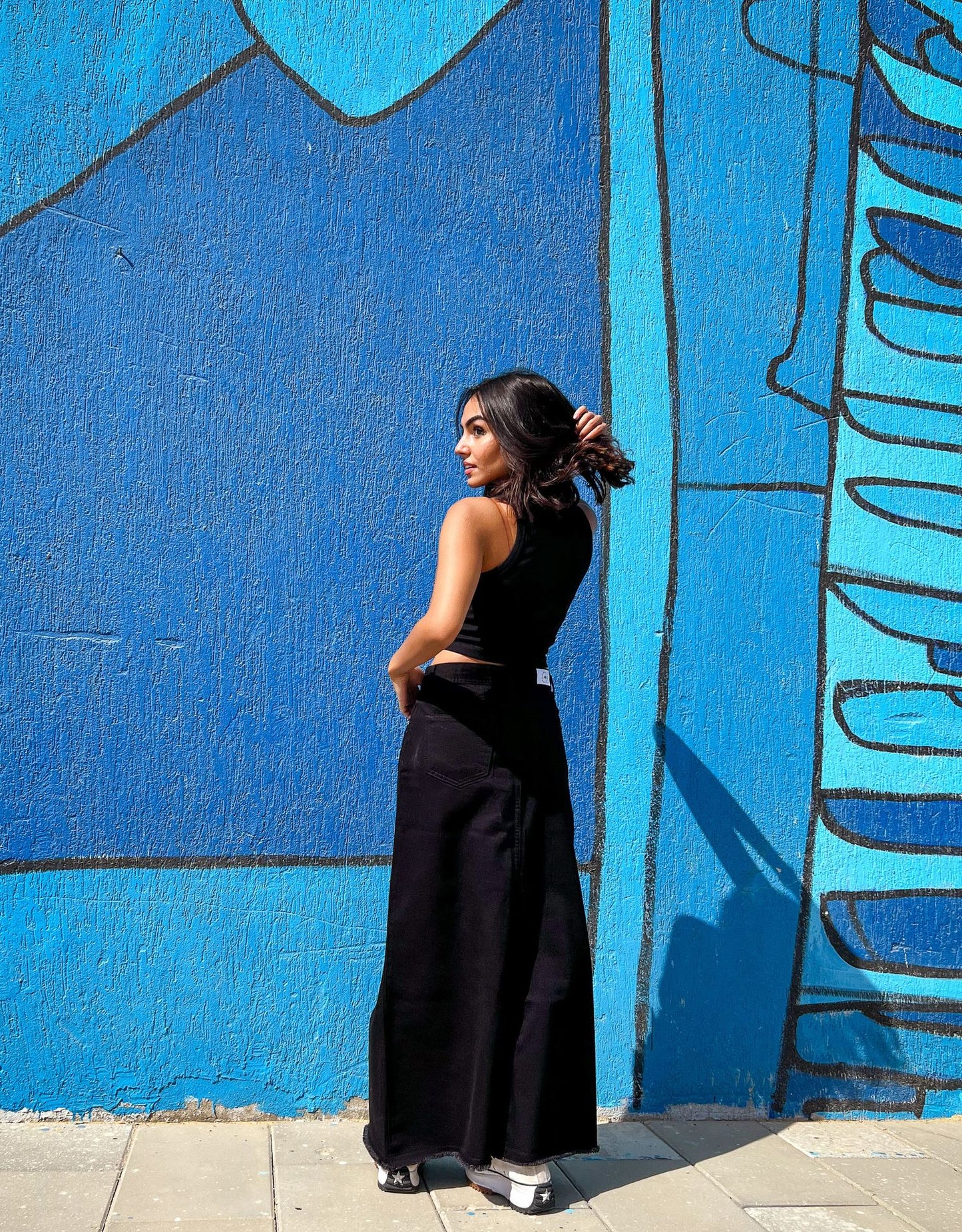 Gonna in gabardine con spacco nero