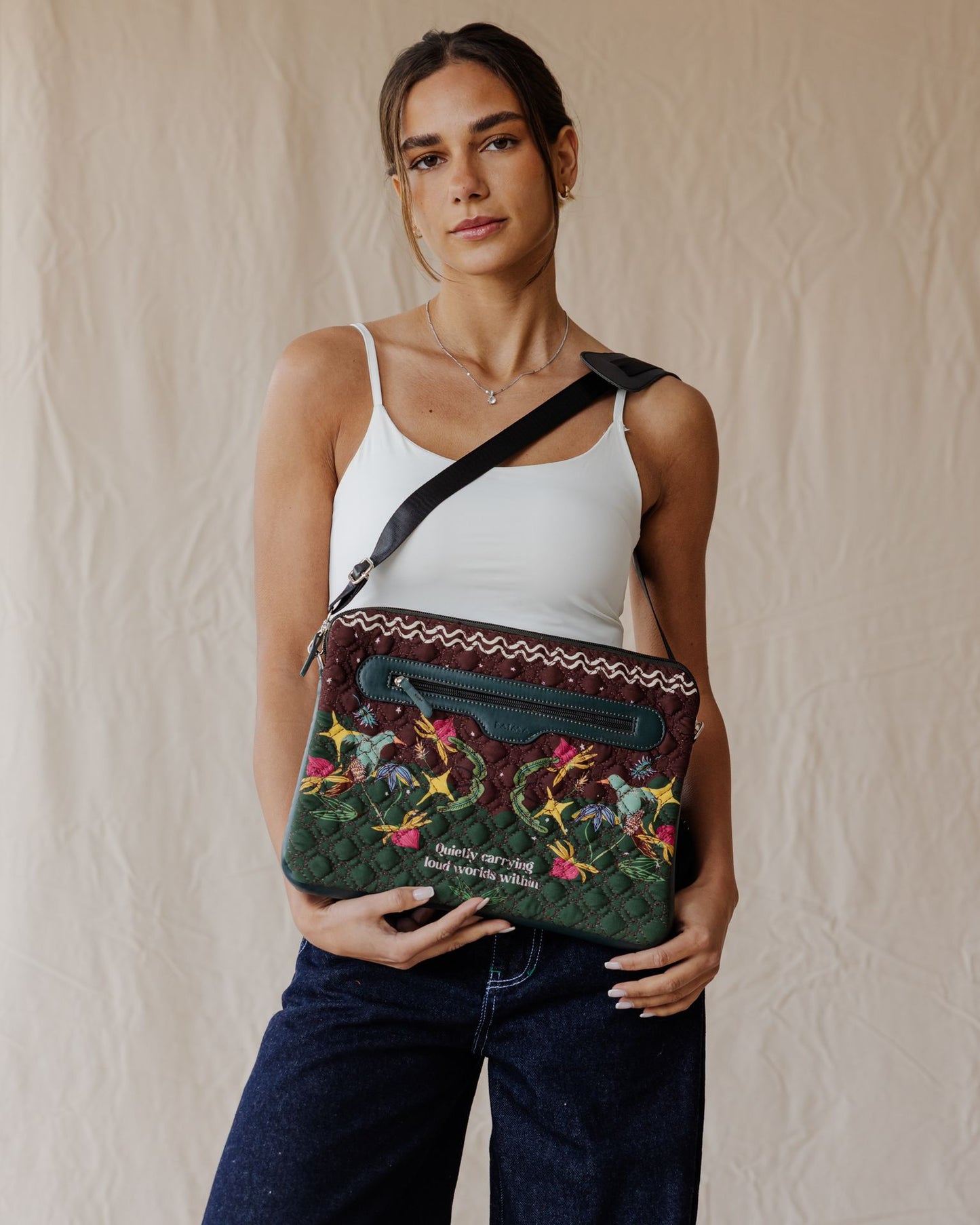Loud Worlds In Dark Quilted Sleeve