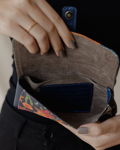 Red Blossoms In Navy Purse