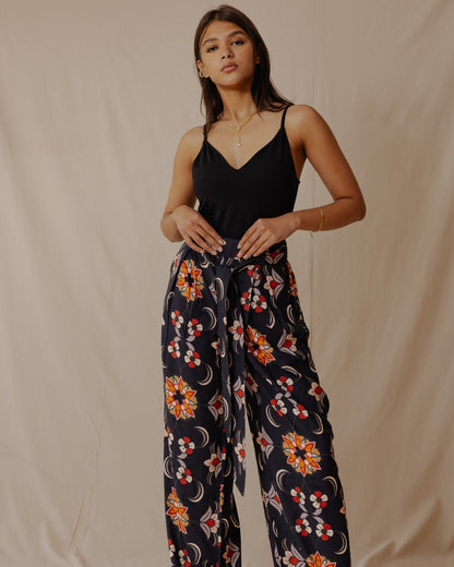 Pantaloni in cotone rosa damascato nero