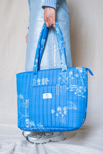 Bolso de mano acolchado con palmeras blancas