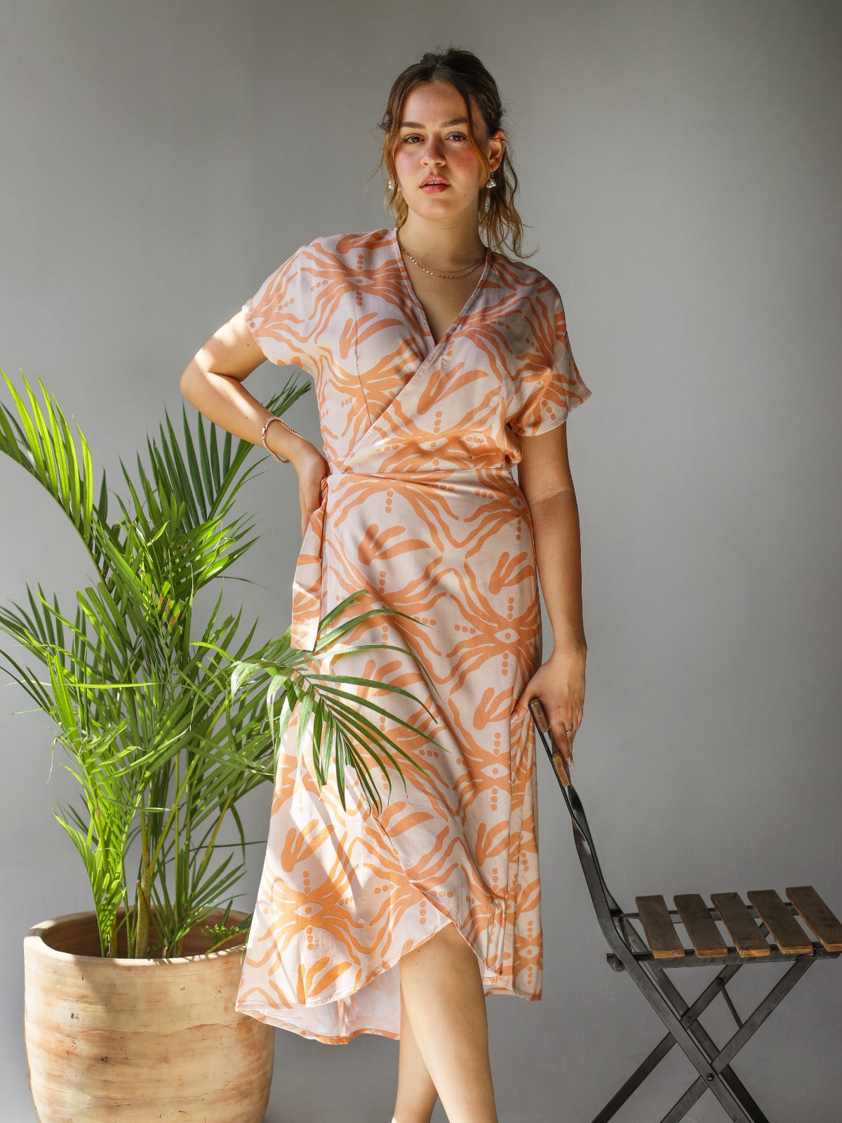 Vestito estivo a forma di stella marina color sabbia