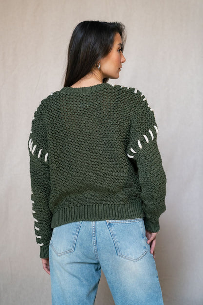 Il maglione cucito a mano Oliva