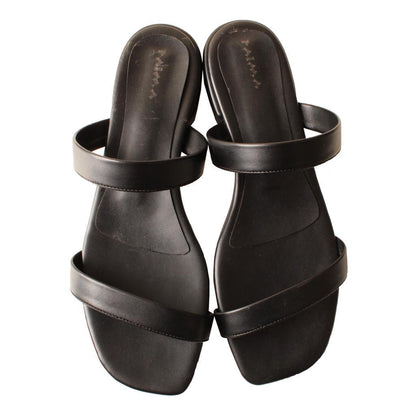 Sandalias minimalistas negras de dos tiras