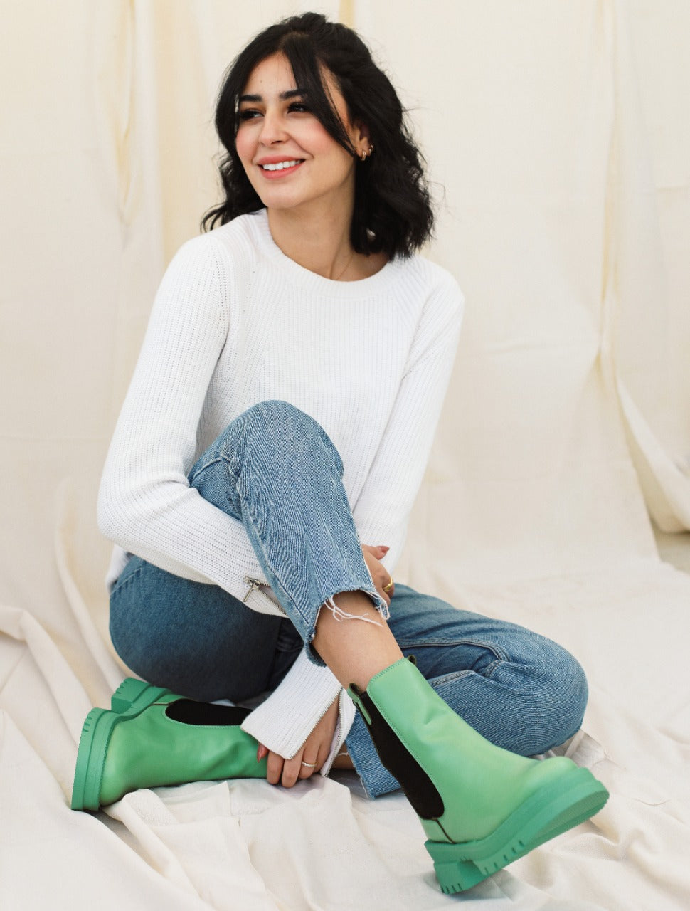 Os botins no verde caribenho