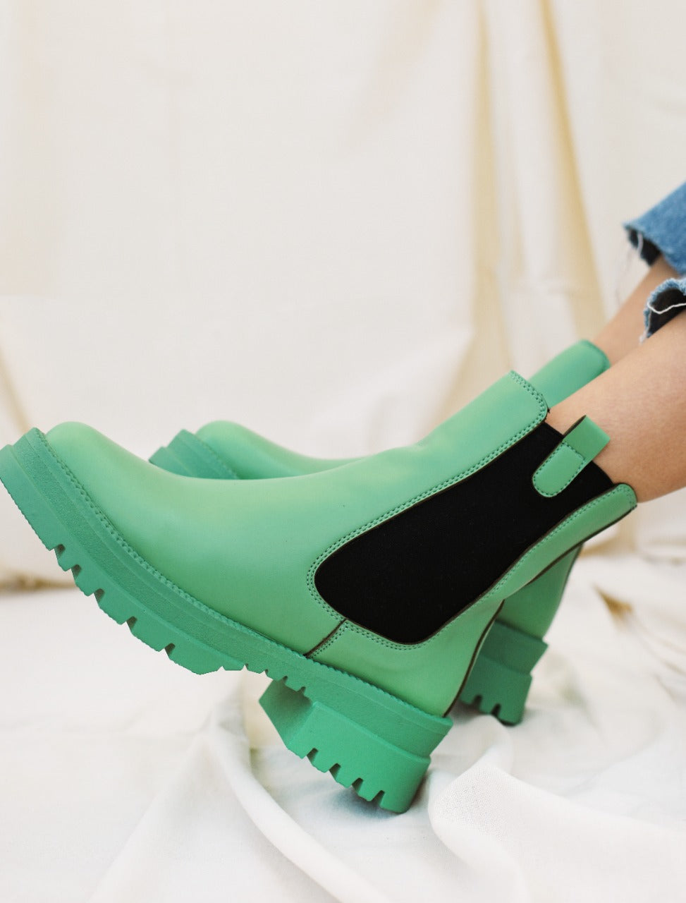 Os botins no verde caribenho
