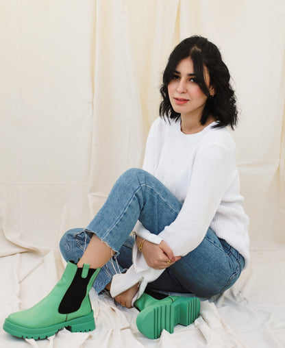 Os botins no verde caribenho
